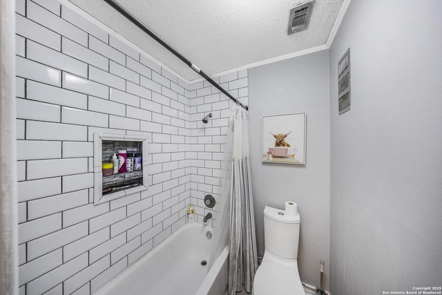 bathroom with crown molding, toilet, a textured ceiling, and shower / bath combo with shower curtain