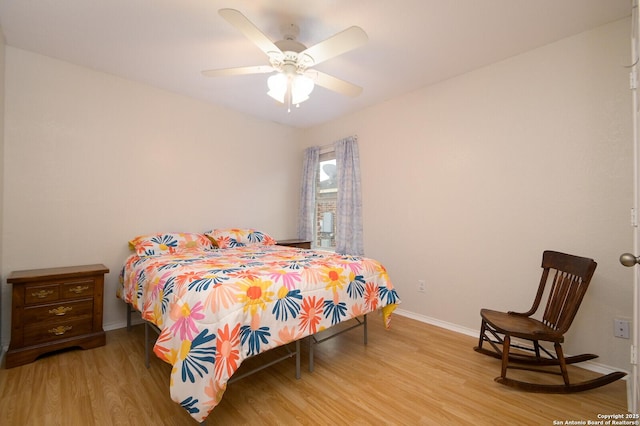 bedroom featuring ceiling fan and light wood-type flooring