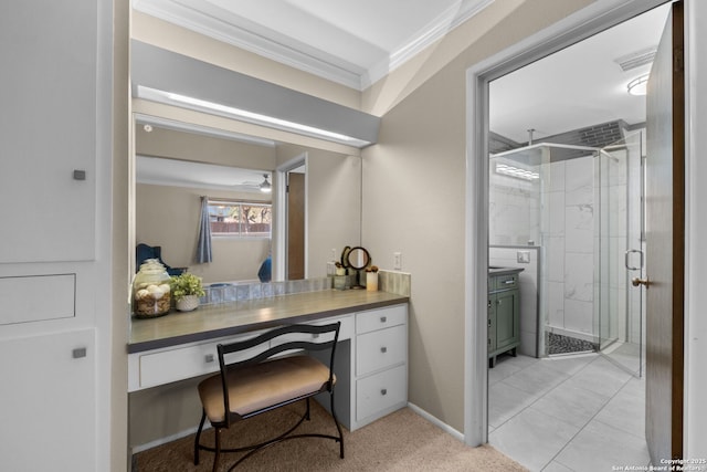 bathroom with ornamental molding, vanity, and an enclosed shower