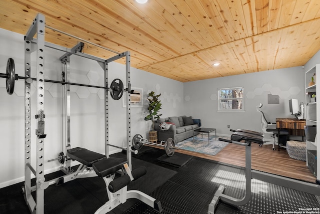 exercise room with wood ceiling