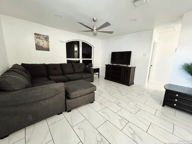 living room featuring ceiling fan