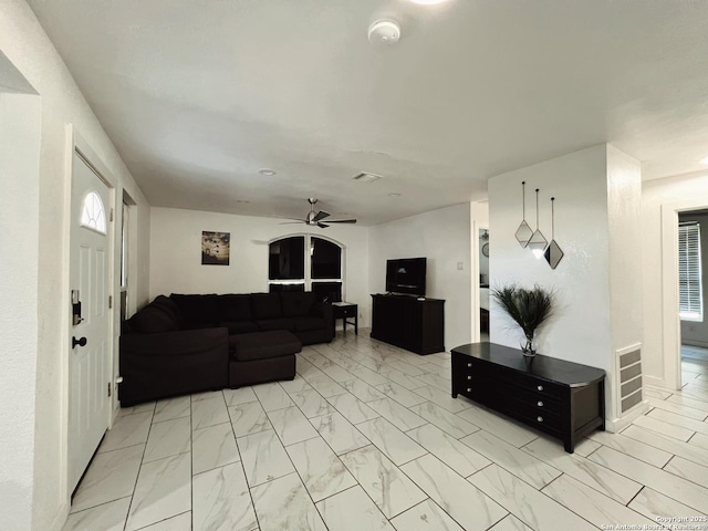 living room with ceiling fan