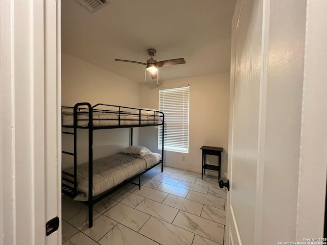 bedroom featuring ceiling fan