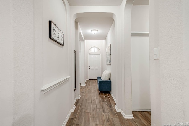 corridor featuring light wood-type flooring