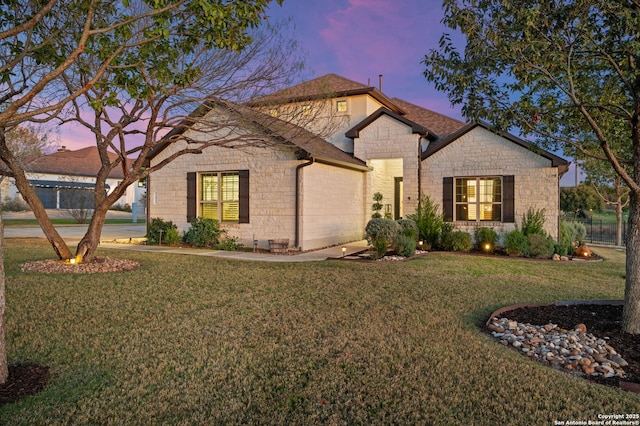 view of front of home featuring a yard