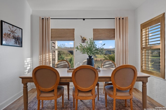 dining area featuring hardwood / wood-style flooring