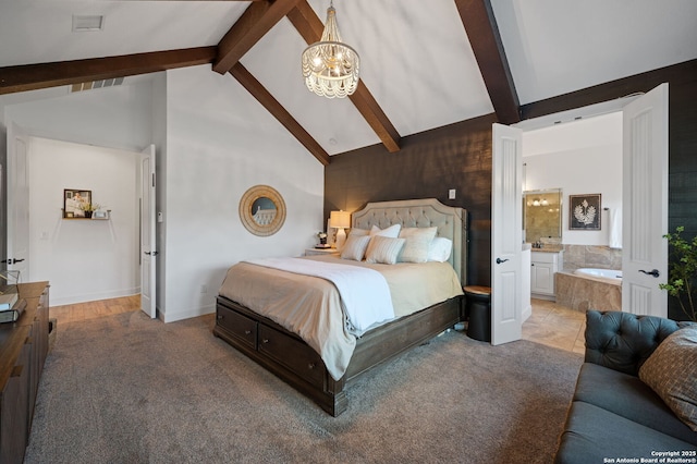 carpeted bedroom with a notable chandelier, beam ceiling, ensuite bath, and high vaulted ceiling