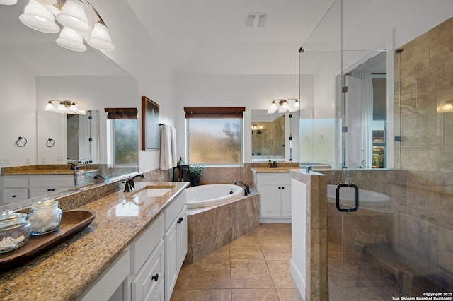 bathroom with vanity, tile patterned floors, a chandelier, and separate shower and tub