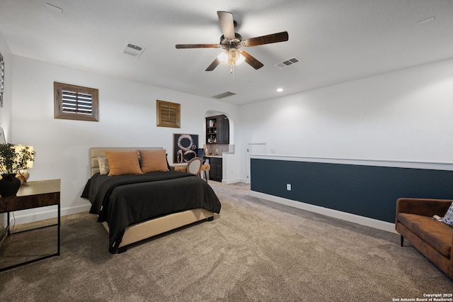 carpeted bedroom featuring ceiling fan