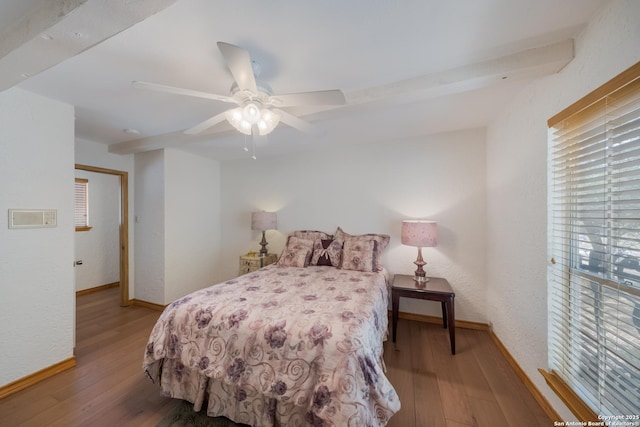 bedroom featuring hardwood / wood-style flooring and ceiling fan