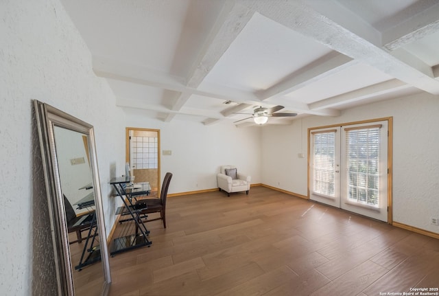 office space with hardwood / wood-style flooring, coffered ceiling, ceiling fan, beam ceiling, and french doors