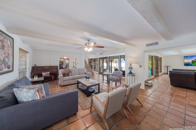 living room with beamed ceiling and ceiling fan