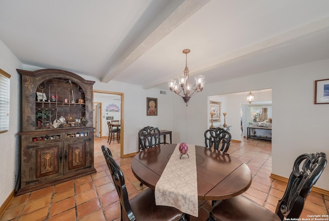 dining room with light tile patterned flooring, a chandelier, and beam ceiling