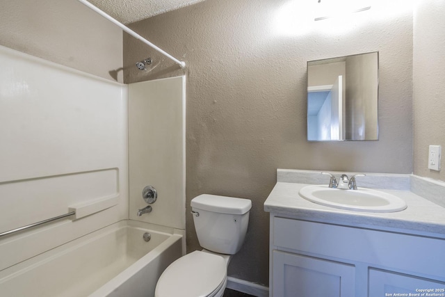 full bathroom with vanity, shower / tub combination, and toilet