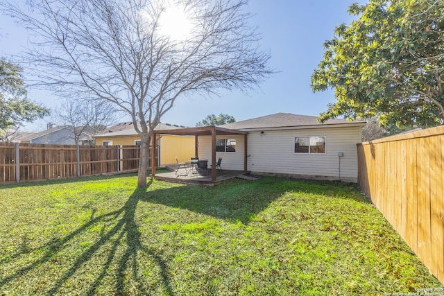 back of property with a patio and a yard