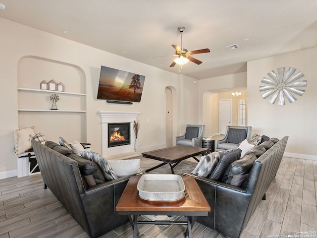 living room featuring ceiling fan