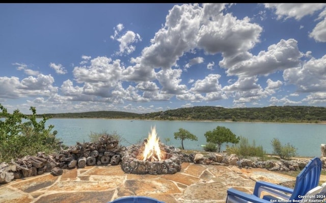 view of water feature featuring a fire pit