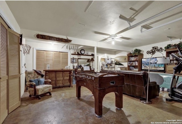 game room with ceiling fan