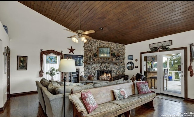 living room with dark hardwood / wood-style flooring, high vaulted ceiling, a fireplace, and wooden ceiling