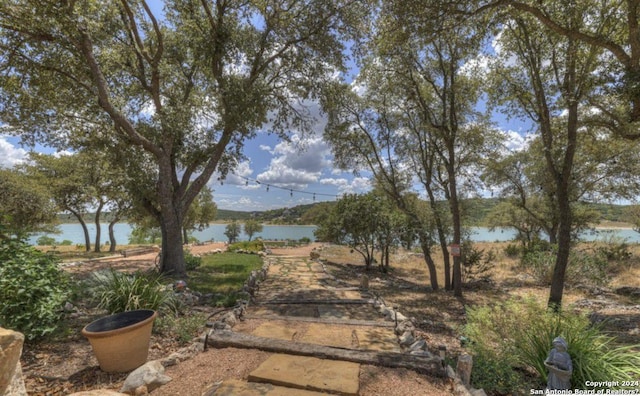 view of yard with a water view