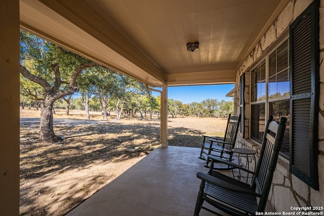 view of patio featuring covered porch