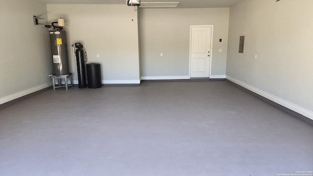 garage featuring a garage door opener, electric water heater, and electric panel