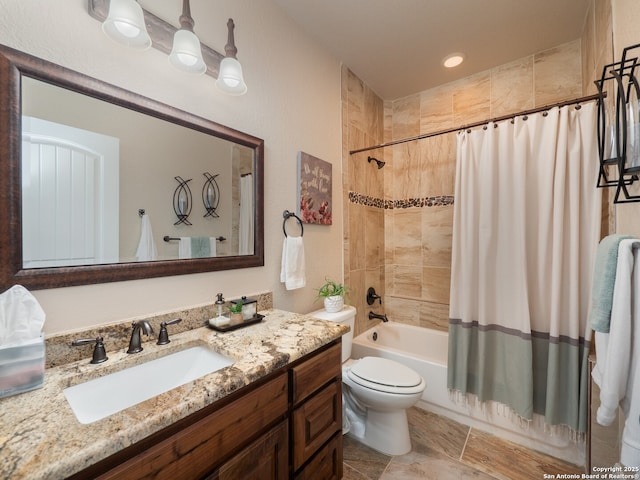 full bath featuring toilet, shower / bath combo, and vanity