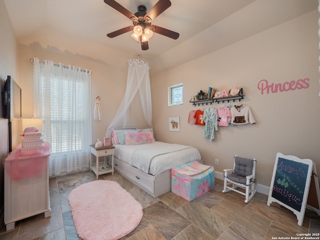 bedroom featuring baseboards and ceiling fan
