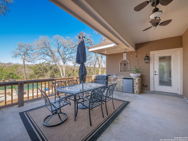 view of patio / terrace with ceiling fan, outdoor dining area, and area for grilling