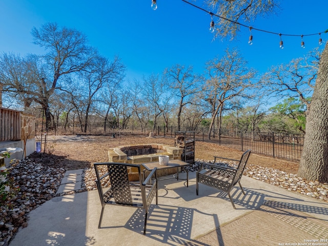 view of patio / terrace with outdoor lounge area and fence