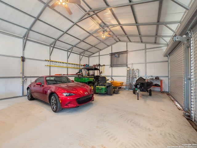 garage featuring a ceiling fan and metal wall