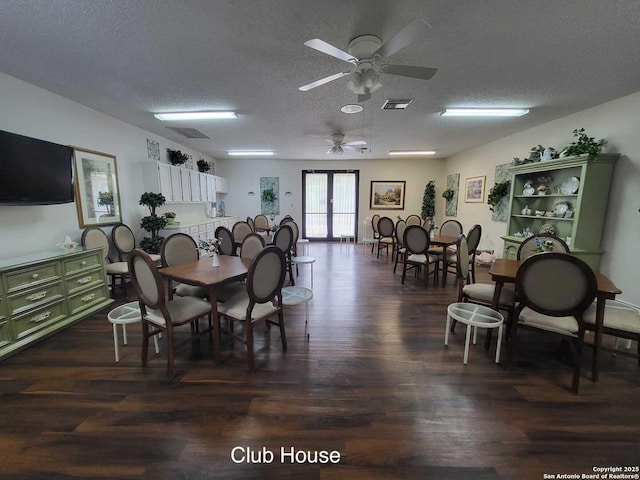 3601 Elm Ct, Schertz, TX 78108 - dining area featuring a textured ceiling, ceiling fan, visible vents, and dark wood-style flooring