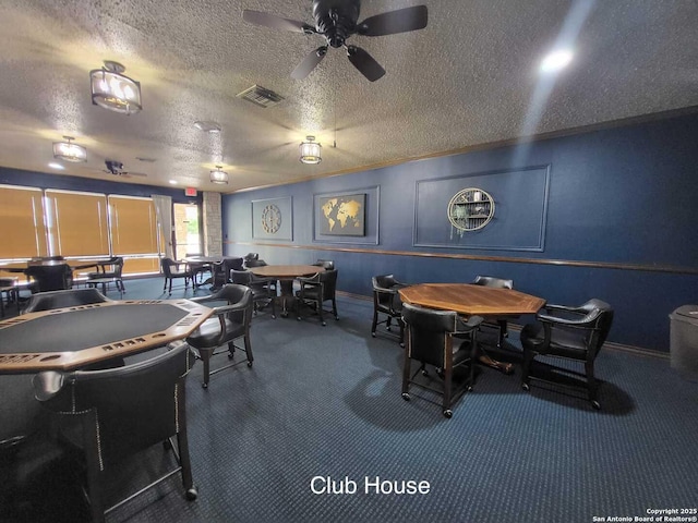 3601 Elm Ct, Schertz, TX 78108 - playroom with a ceiling fan, a textured ceiling, carpet, baseboards, and visible vents