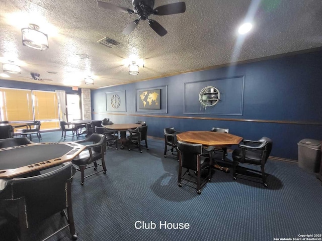3601 Elm Ct, Schertz, TX 78108 - carpeted dining room featuring baseboards, a ceiling fan, visible vents, and a textured ceiling