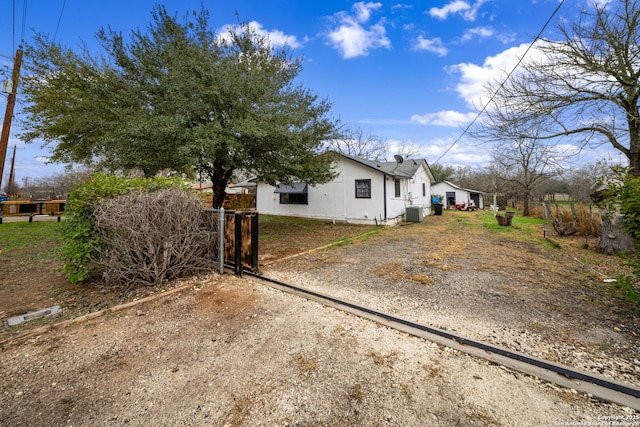 view of home's exterior featuring central AC unit