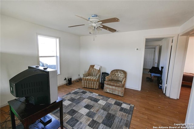 interior space featuring dark hardwood / wood-style floors and ceiling fan