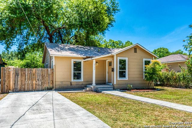 view of front of home with a front lawn