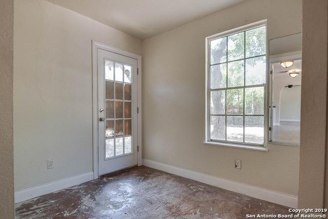 entryway with plenty of natural light and concrete floors