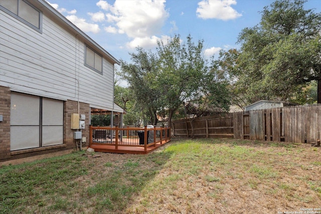 view of yard with a deck