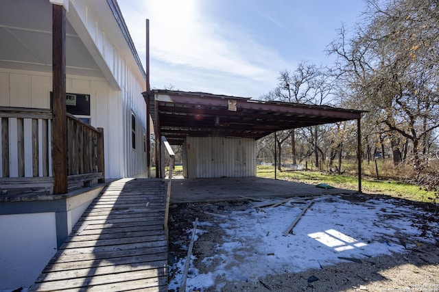 deck featuring a carport