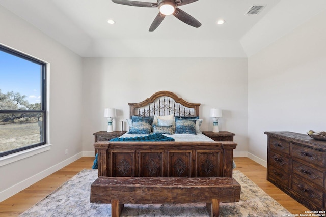 bedroom featuring ceiling fan and light hardwood / wood-style flooring