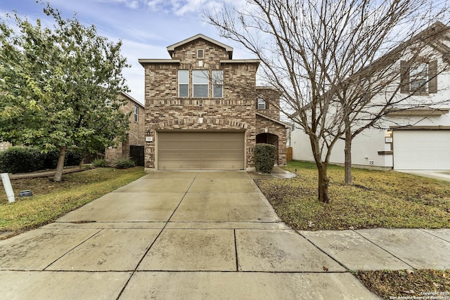 front of property with a garage