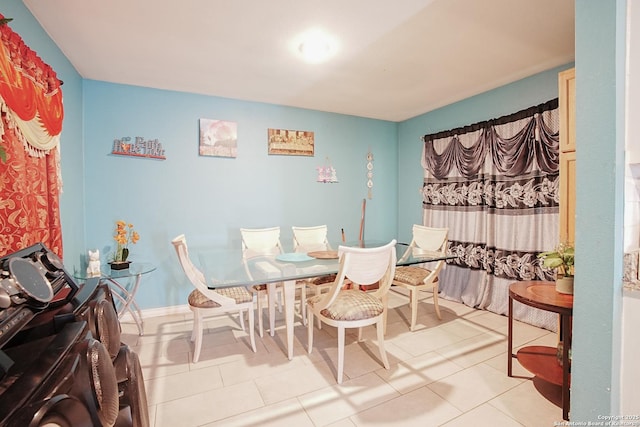 dining room featuring light tile patterned floors