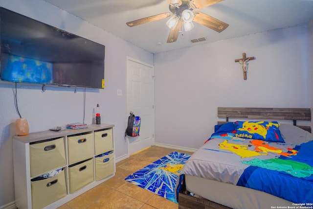 bedroom featuring ceiling fan and light tile patterned flooring