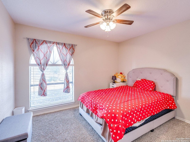 bedroom featuring carpet floors and ceiling fan