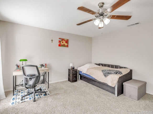 bedroom with light carpet and ceiling fan