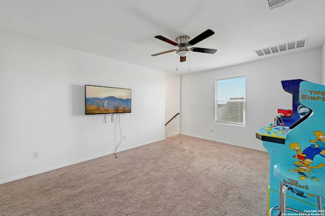 game room featuring ceiling fan and carpet