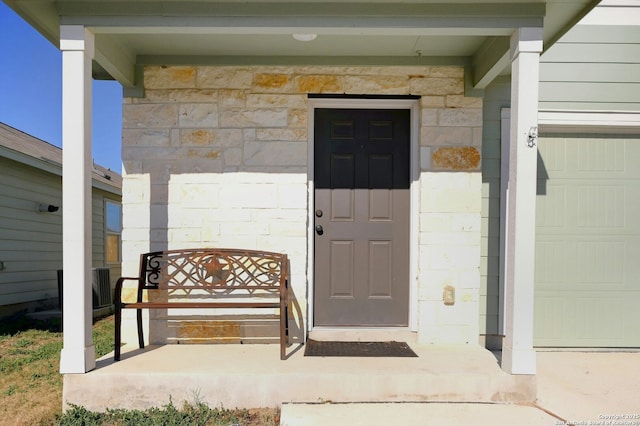 property entrance with covered porch