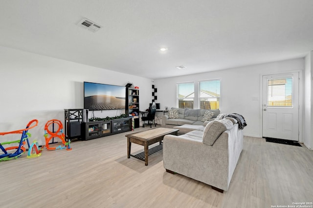 living room featuring light hardwood / wood-style flooring