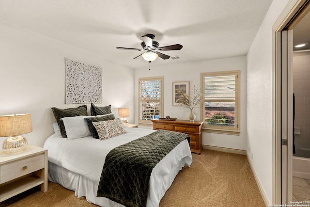 bedroom with light carpet and ceiling fan